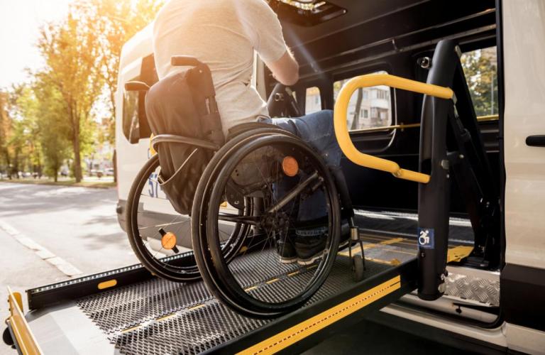 Person in a wheelchair on a lift