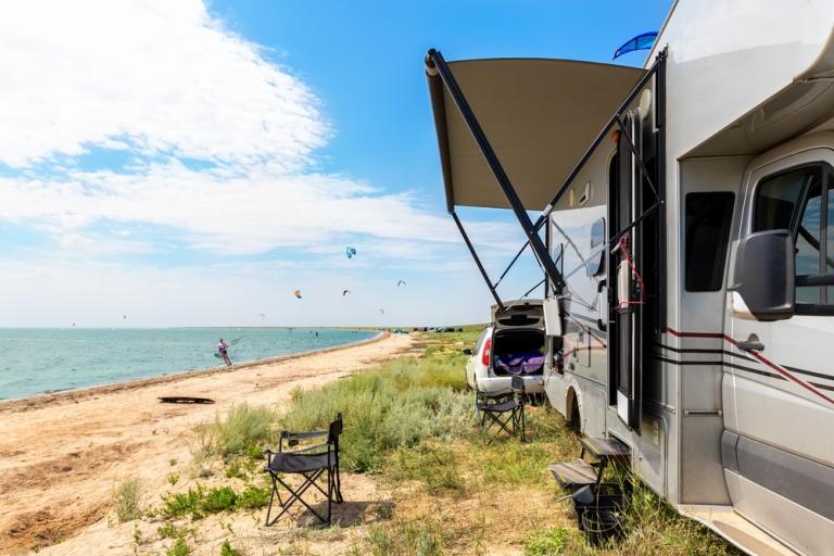 RV parked on a sunny beach