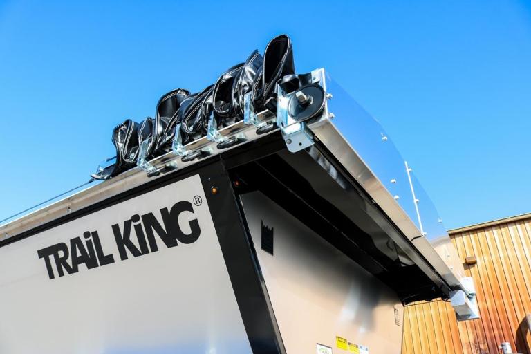 Corner of a Trail King trailer featuring Trail King logo