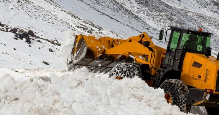 Tire Chains Snow Plow in Colorado Mountain Driving