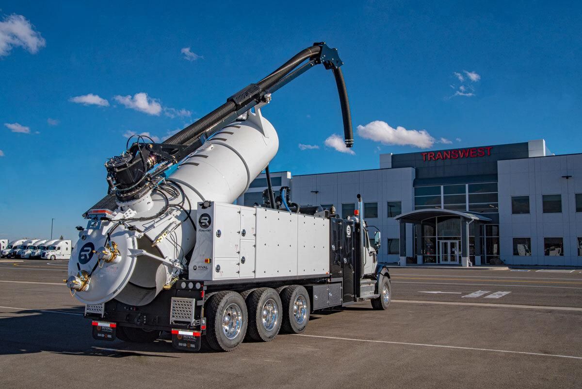 Rival hydrovac truck in front of Transwest building