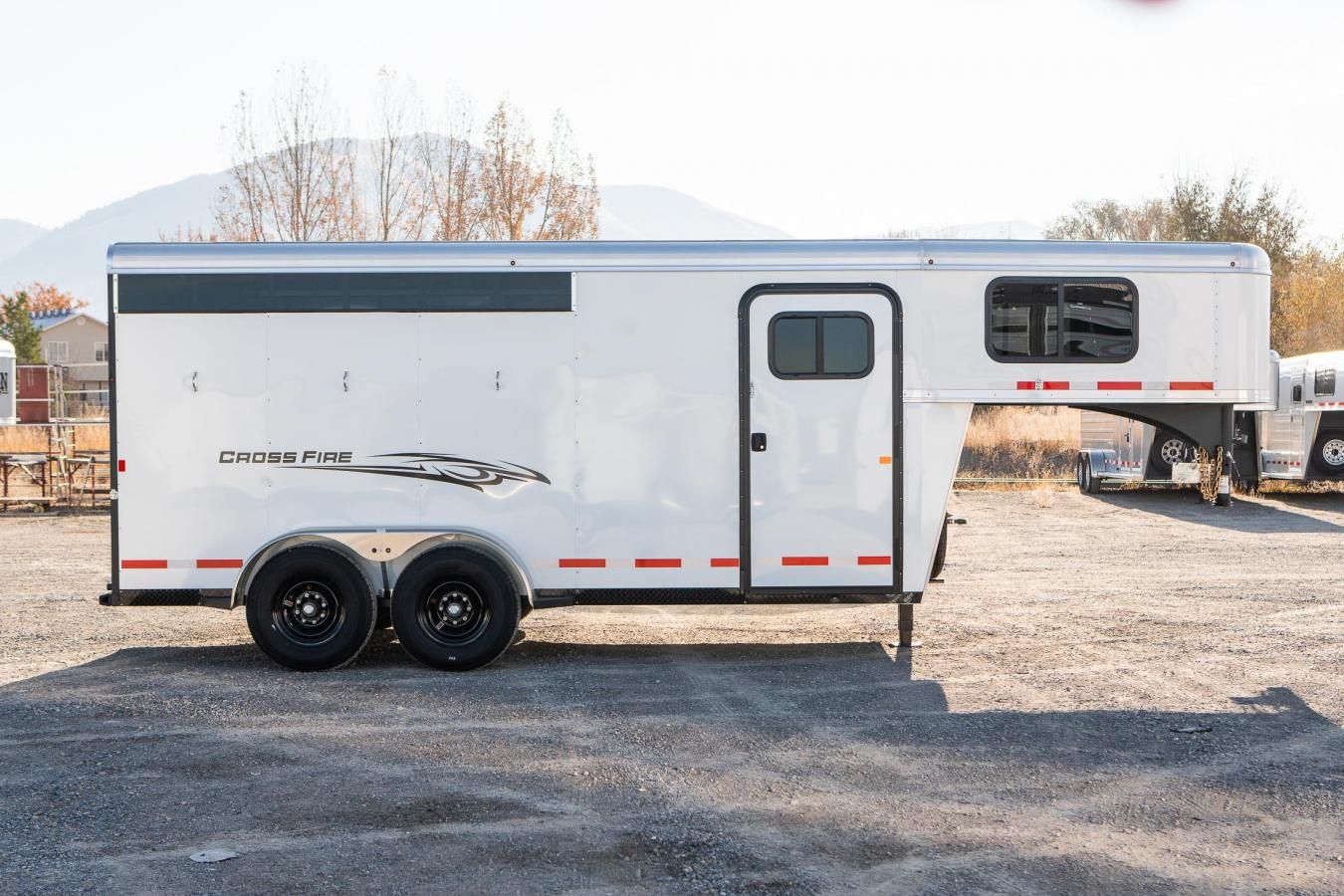 An exterior shot of a white Logan Coach Trailer