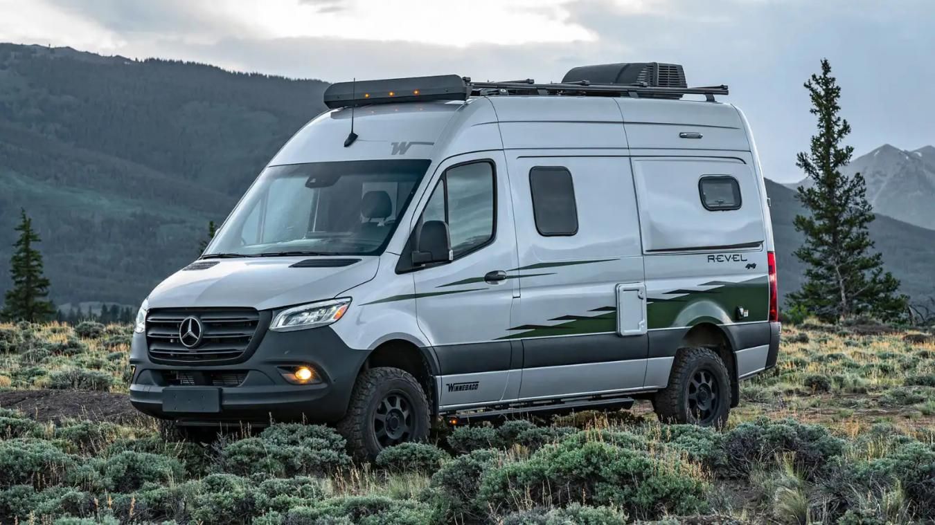 Winnebago RV pictured in a mountain scenery