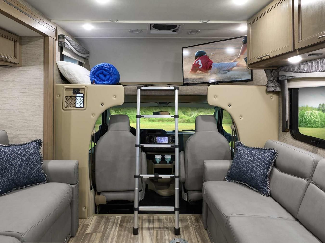 Bunk over the driver&#039;s seat inside a Thor Class C RV