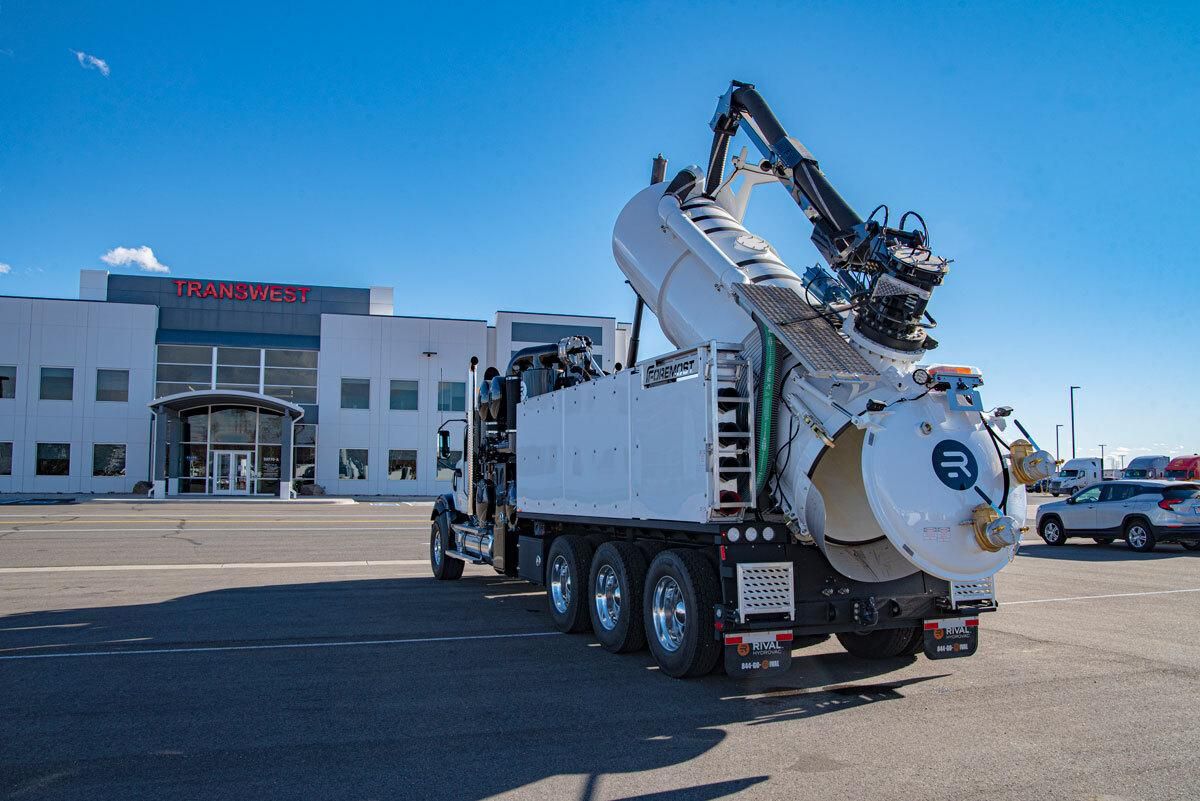 Rival hydrovac truck in front of Transwest building