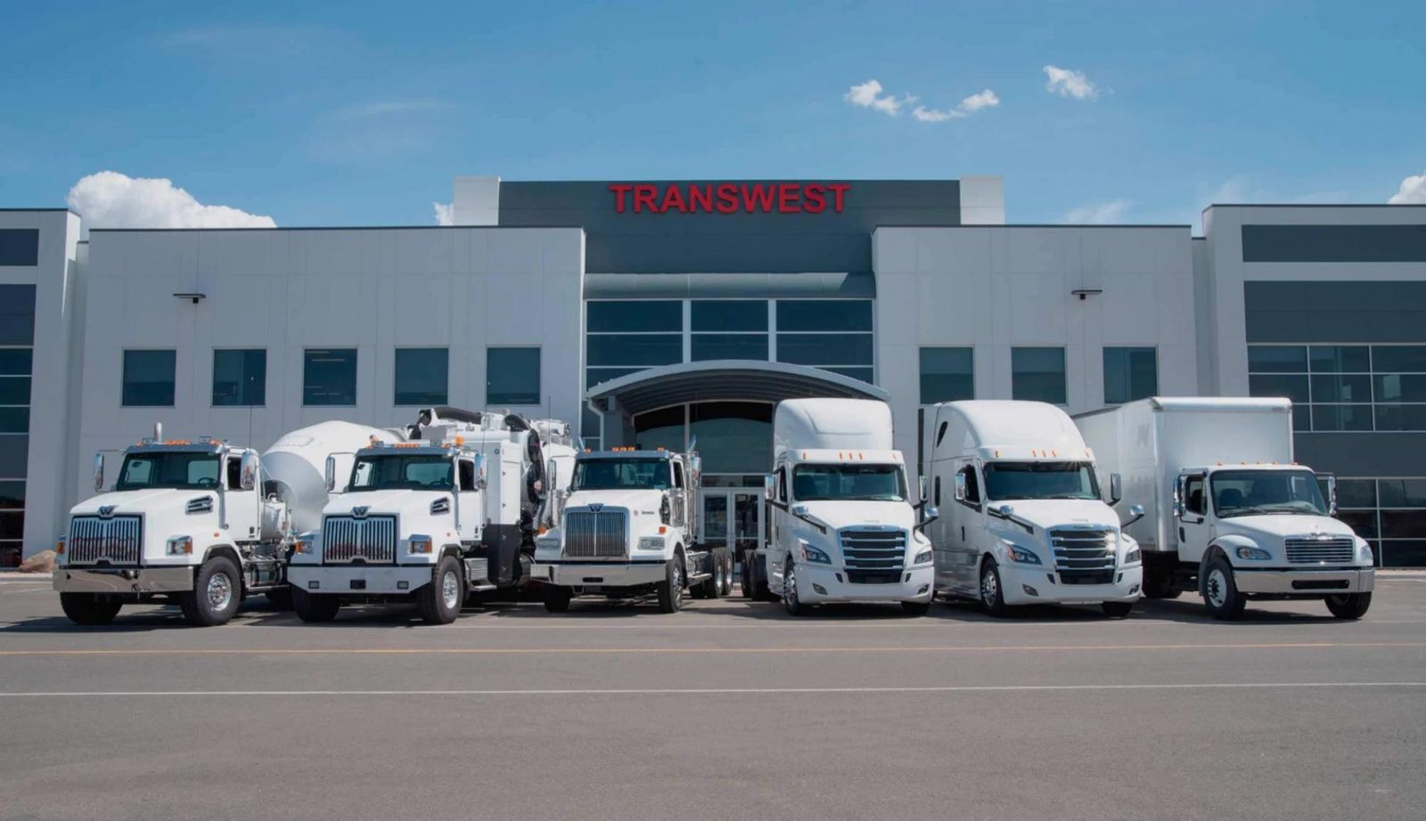 Trucks in front of Transwest building