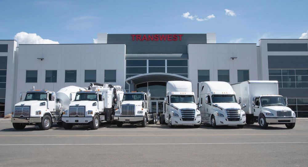 Trucks parked in front of Transwest