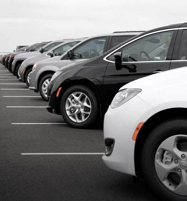 Row of minivans and SUVs